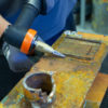Welded plate grinding